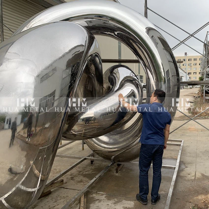 stainless steel crab sculpture inspection